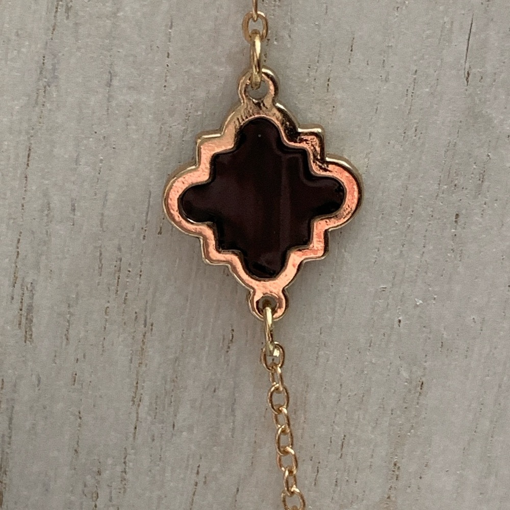 Gold-Plated Bracelet with Dark Brown Enamel Quatrefoil Charm